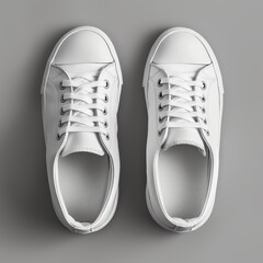 Minimal white sneakers on a solid grey background, perfect for showcasing custom shoe designs or fashion branding