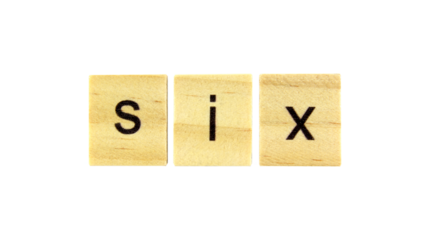 Short word english letter with text "six" on a small wooden cubes block isolated on white background.