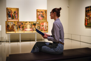 Women in the museum looks at art exhibitions
