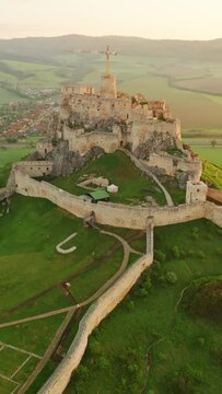 Aerial view of the Spis castle at sunrise, Unesco World Heritage Site, Slovakia. Spissky hrad medieval castle. Spis Castle in the town of Spisske Podhradie in Slovakia.