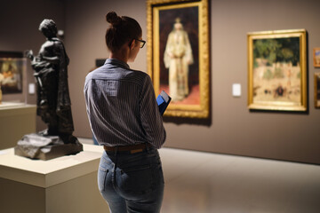 Women in the museum looks at art exhibitions