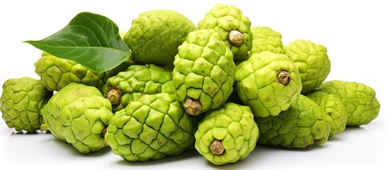 Fototapeta premium Noni fruits displayed on a white background providing ample copy space for creative use