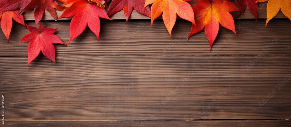 Poster a wooden background adorned with vibrant red autumn leaves provides a frame for text offering ample 