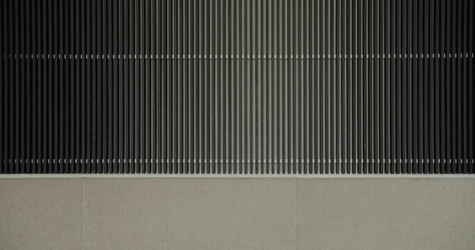 Close-up view of modern building facade showcasing contrasting textures and linear patterns. Ideal for architecture and design themes. Modern Architecture Detailing Textures and Linear Patterns
