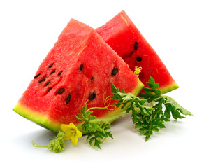 Fresh watermelon fruit with leaves.