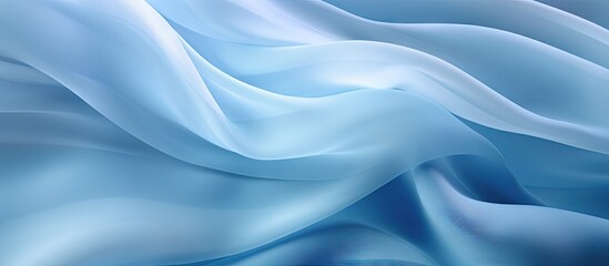 Close up of a soft abstract multicolored chiffon fabric texture with a wavy and transparent appearance in a delightful shade of blue. Copy space image. Place for adding text and design