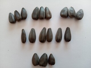 Sunflower seeds isolated on the table. Nature foods background