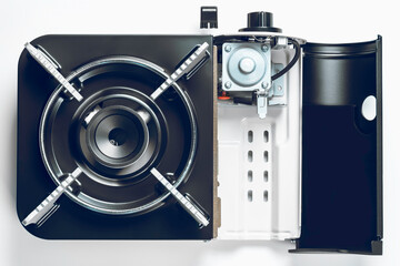 Gas stove with open compartment for gas cylinder. Camp and kitchen stove. Repair and maintenance of gas equipment.