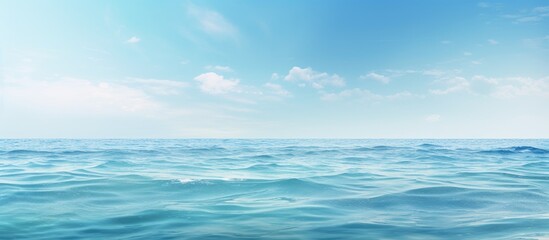 Obraz premium A serene seascape with gentle waves lapping at the water s edge offering a calming copy space image