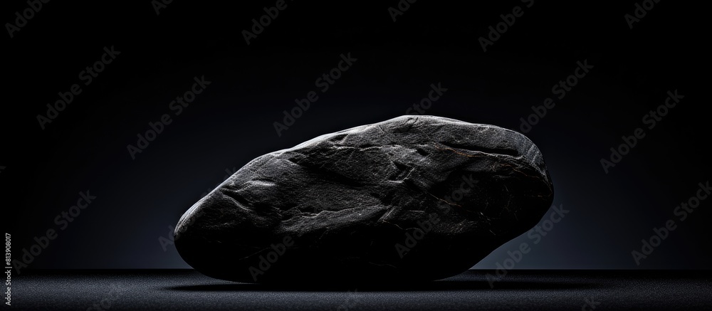 Poster black background with a stone abstract design providing ample copy space for images