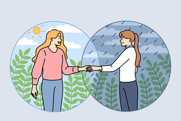 Woman helps friend get rid of depression by extending hand to girl standing in rain and inviting to sunny place. Helps and mutual assistance between people manifested through empathy and complacency