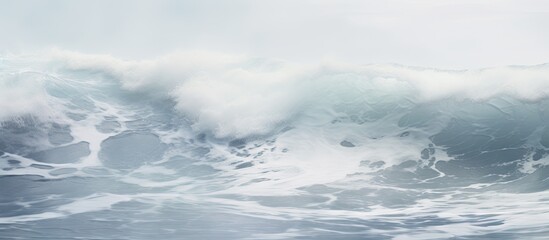 An expansive pastel gray sea with a turbulent texture resembling a raging ocean offering ample copy...