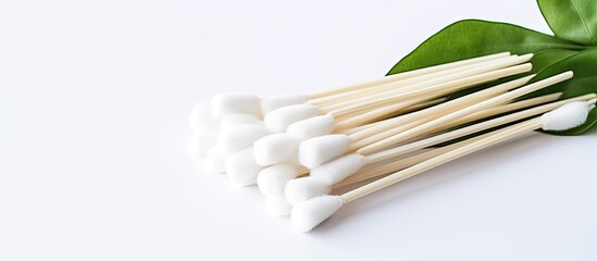 Eco friendly bamboo cotton buds for the hygiene of nose and ears showcased in a copy space image with white background