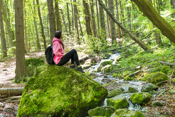 Traveler Woman  in the  spring green forest  .Vitosha Mountain ,Bulgaria