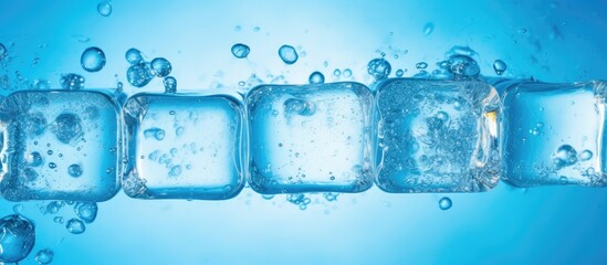 An image of bubbles trapped within a block of vibrant blue ice providing a beautiful copy space image