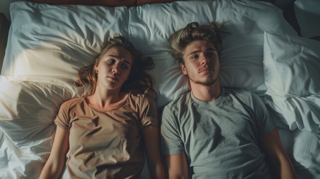 In a bed of quarreling young people, they are turned away from each other, holding grudges and offended.