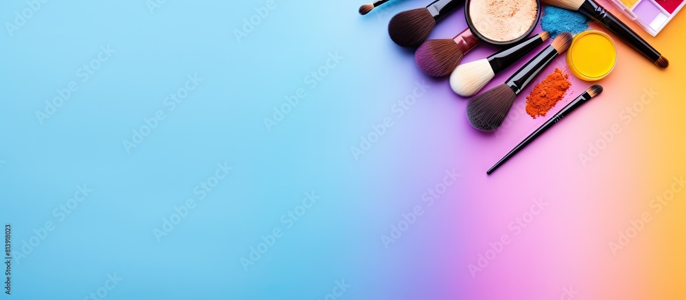 Poster colorful background with a flat lay of various makeup products and tools providing a copy space imag