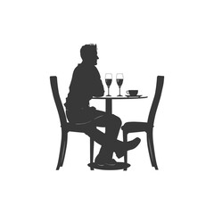 Silhouette man sitting at a table in the cafe black color only