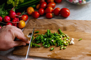 A fresh vegetable salad. Preparing the salad