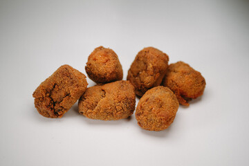 Homemade croquettes with black background