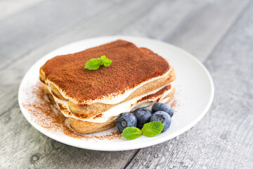 Homemade tiramisu cake . Food background. Sweet Italian dessert . 