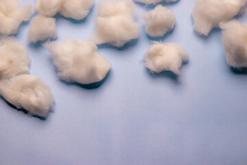 Cotton clouds on a sky blue background, business concept