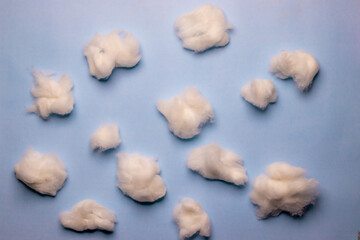 Cotton clouds on a sky blue background, business concept