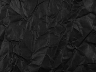 black crumpled paper texture pattern