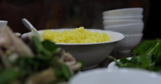 Yellow rice Vietnamese cuisine Rice is cooked in chicken broth turns yellow you can add turmeric Indian Asian Vietnamese cuisine