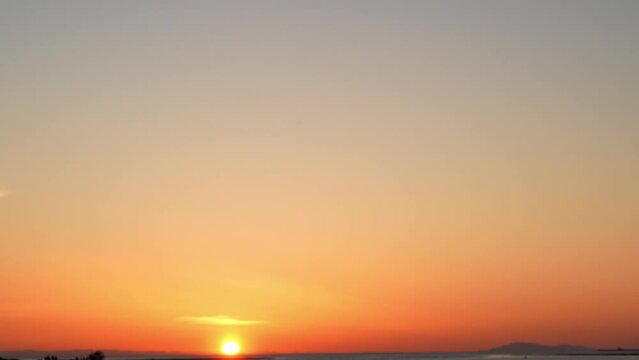 Serene Sunset over Calm Waters