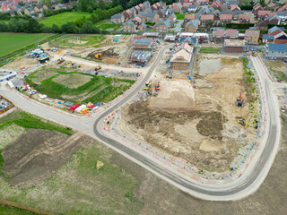 Drone view of a new affordable and private homes development site in the east of England. In the...