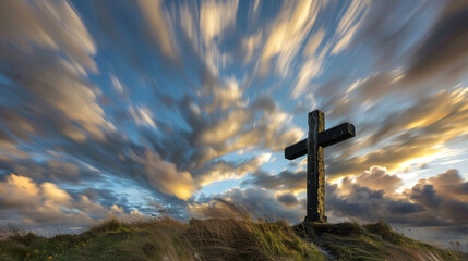 A Christian cross on a windswept hill with a dynamic sky, where moving clouds create a...