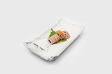 Burn Otoro Sushi with Uni on top serve on marble plate