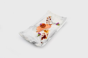 Burn Salmon Sushi with Saikyo sauce on top serve on marble plate