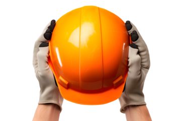 A man's hands hold a builder's helmet on a white or transparent background. Close-up of a builder's hands holding an orange helmet. Graphic design element on the theme of construction.
