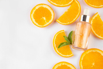 Orange citrus Vitamin C face care - cream, serum. mask, face cleaner, antioxidant moisturizer skin face care and make up concept, with fresh orange fruit slices