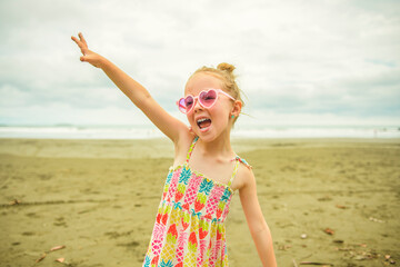 Portrait of girl of 4 years on beach of Costa Rica