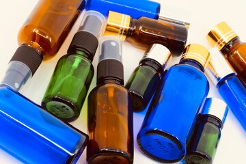 Bottles of essential oil made with herbs