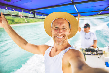 A man standing on boat when having a great tour