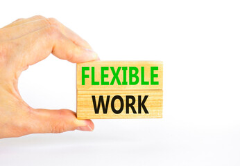 Flexible work symbol. Concept words Flexible work on beautiful wooden block. Beautiful white paper...