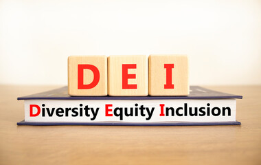 DEI diversity equity and inclusion symbol. Concept words DEI diversity equity inclusion on blocks...