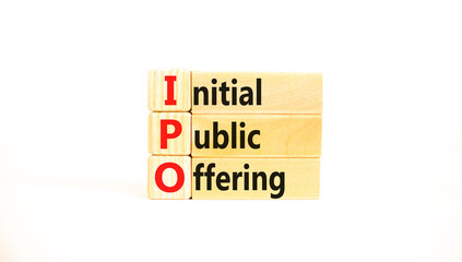 IPO initial public offering symbol. Concept words IPO initial public offering on beautiful wooden blocks. Beautiful white background. Business IPO initial public offering concept. Copy space.