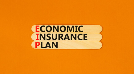 EIP economic insurance plan symbol. Concept words EIP economic insurance plan on beautiful wooden stick. Beautiful orange background. Business EIP economic insurance plan concept. Copy space.