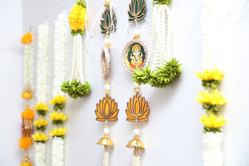 Close up of Doorway flower toran for door hanging in traditional indian homes, Diwali decoration -...