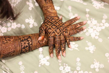 Hand of a Women in Henna or Mehndi Design in Wedding Ceremony Closeup | Henna Hand Desing