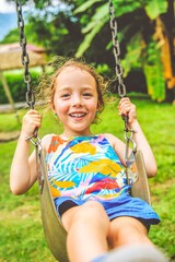 Active little girl having fun on playground
