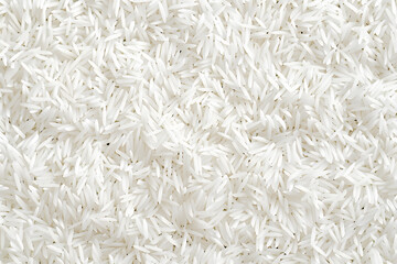 White rice texture background of raw rice.Close up view of dry basmati rice grains.