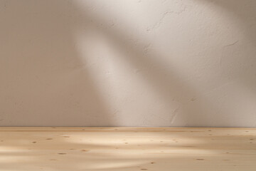 Empty table mockup on stucco background with abstract sun light reflections on the wall.