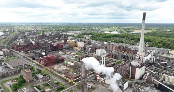 Aerial view on the Krefeld Uerdingen chempark, chemical park, production of polycarbonates and polyamides in Germany. Aerial drone view. Heavy industry.