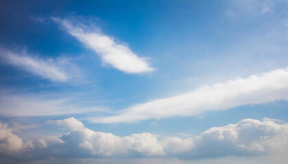Fototapeta premium Blue sky background with white clouds. Cumulus and stratus white clouds in the blue sky.